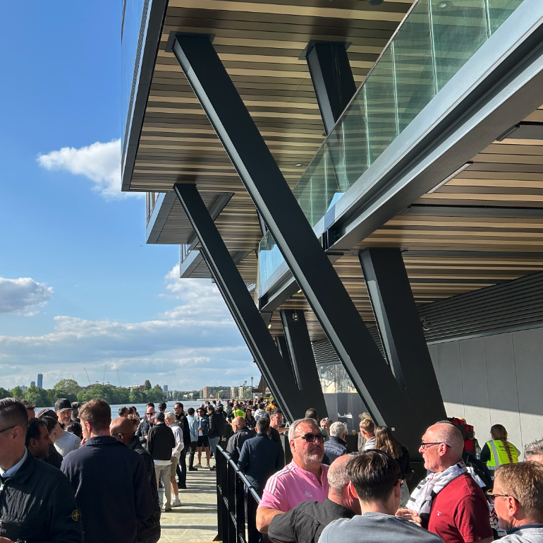 Fulham fans stood outside the Riverside Stand