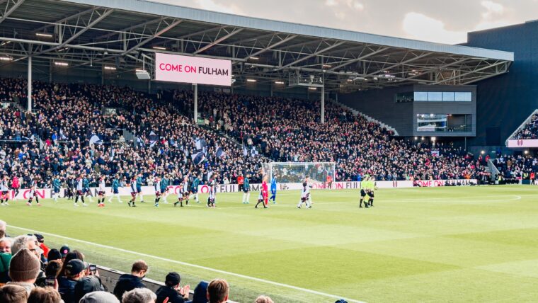 Teams walking out at Craven Cottage