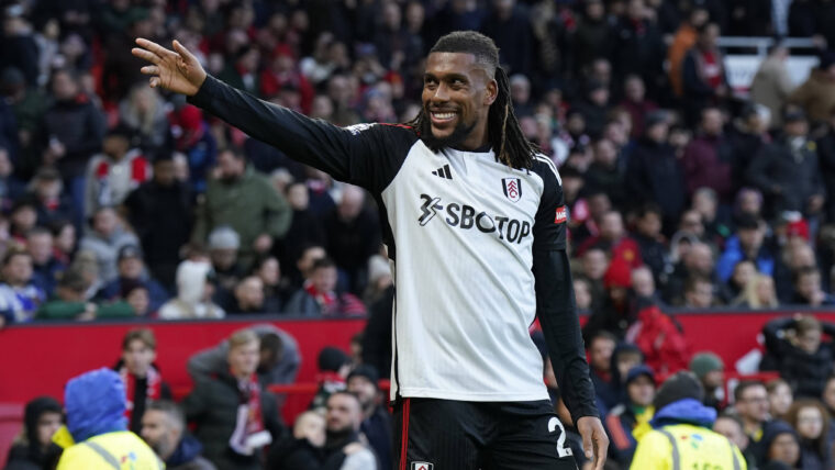 Alex Iwobi of Fulham celebrates scoring their second goal